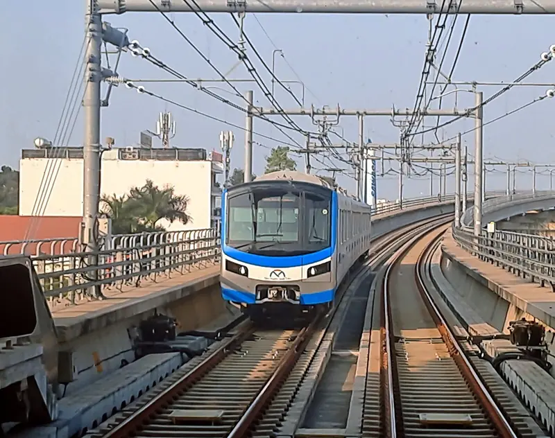A Metro Line 1 train on the elevated track